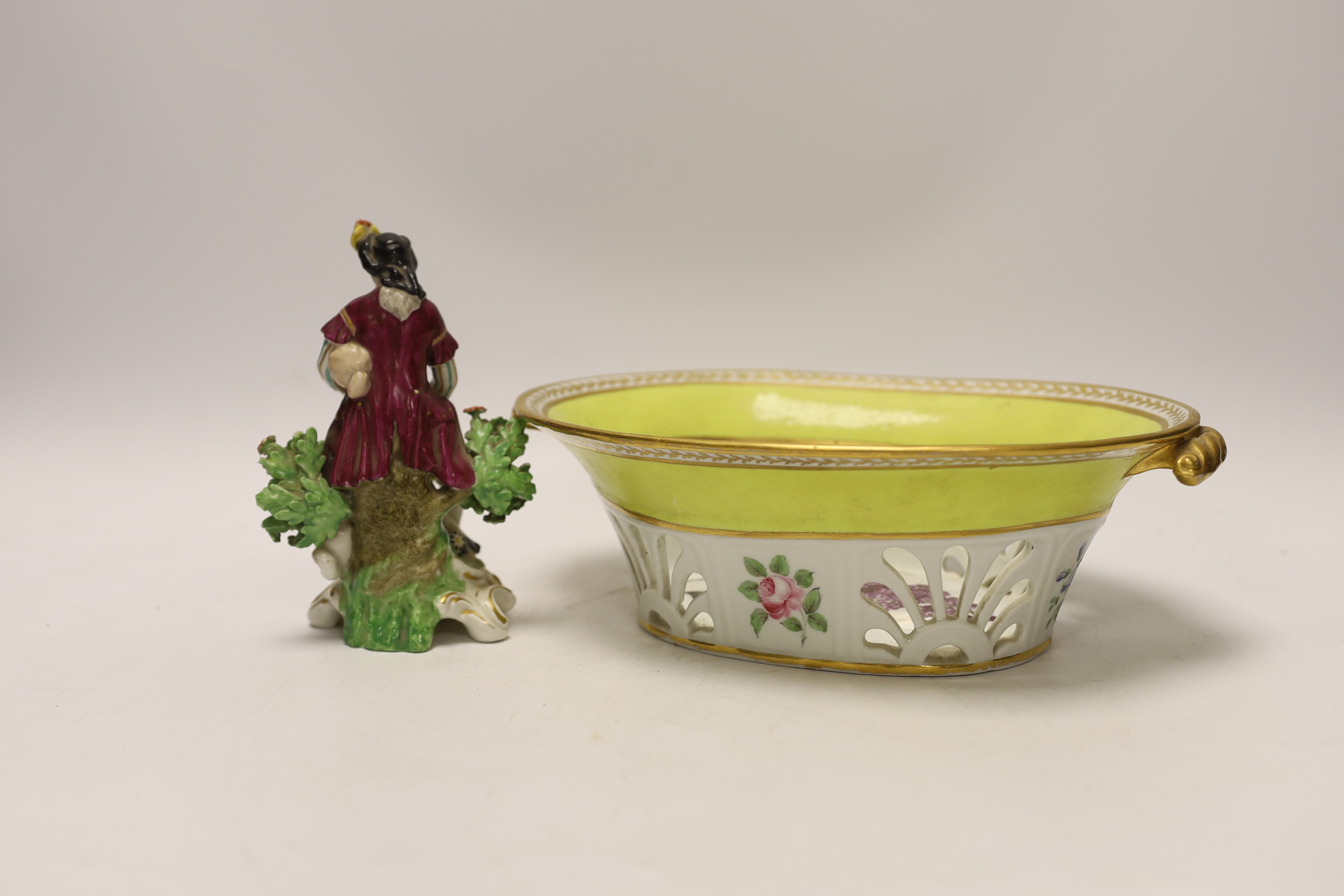 An English porcelain yellow ground botanical specimen basket, c.1795–1800 19th century Derby figure group together with a Victorian ‘Common Lilac’ dish, 25cm